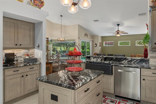 690 E Jenkins Ct, Hernando, FL 34442 - kitchen with stainless steel dishwasher, a chandelier, backsplash, ceiling fan, and vaulted ceiling