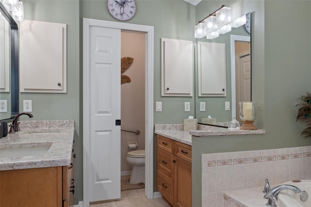 690 E Jenkins Ct, Hernando, FL 34442 - bathroom with double vanity, a bath, and tile patterned flooring