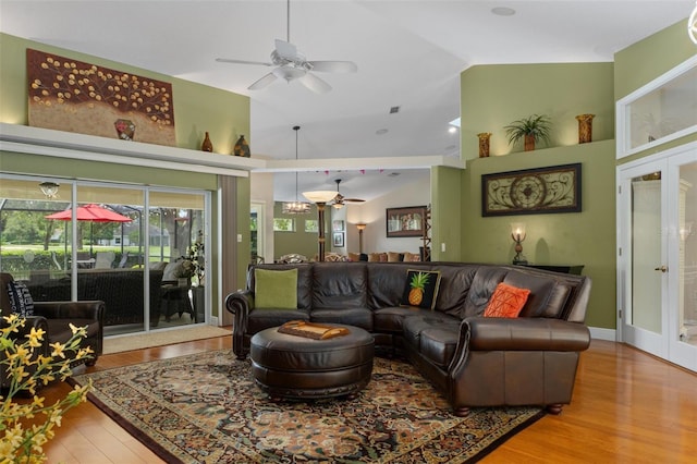 690 E Jenkins Ct, Hernando, FL 34442 - living area featuring a ceiling fan, wood finished floors, french doors, and high vaulted ceiling