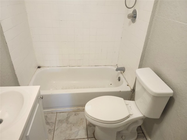 3415 N 51st St, Tampa, FL 33619 - full bathroom with toilet, vanity, a textured wall, and shower / bathtub combination