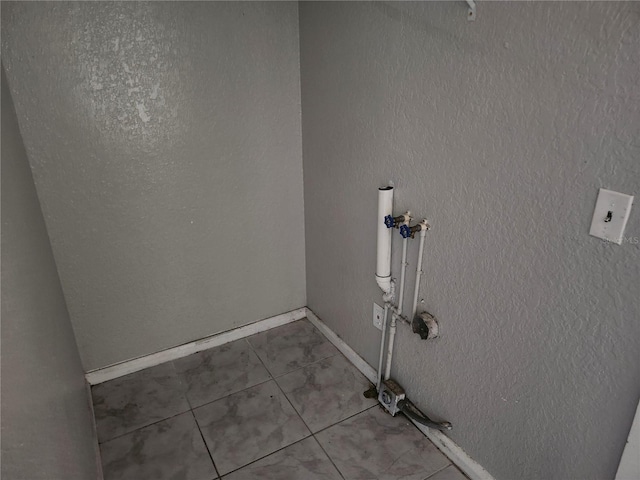 3415 N 51st St, Tampa, FL 33619 - washroom with baseboards and electric dryer hookup