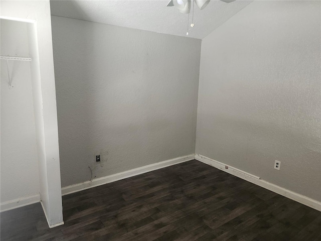 3415 N 51st St, Tampa, FL 33619 - spare room with ceiling fan, dark wood-type flooring, and baseboards