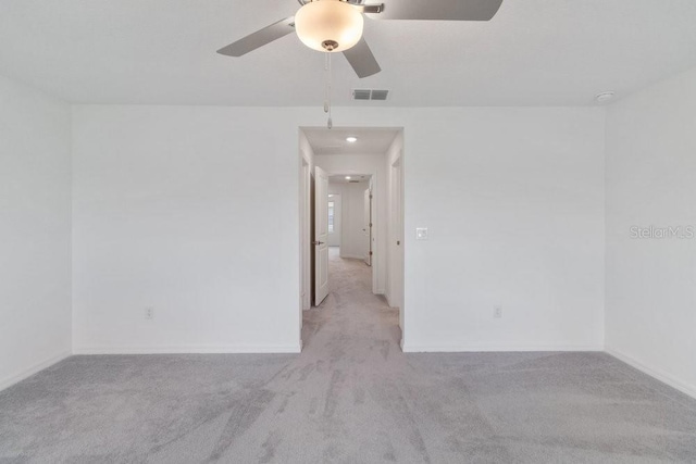 8305 Crescent Oaks Dr, New Port Richey, FL 34655 - empty room featuring carpet and ceiling fan