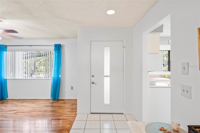 13009 Wedgewood Way Unit 63-D, Hudson, FL 34667 - foyer entrance with a ceiling fan, wood finished floors, a textured ceiling, and recessed lighting