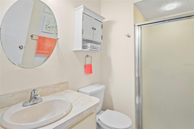13009 Wedgewood Way Unit 63-D, Hudson, FL 34667 - full bathroom with a shower stall, vanity, and a textured ceiling