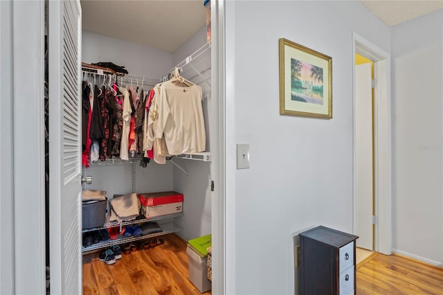 13009 Wedgewood Way Unit 63-D, Hudson, FL 34667 - spacious closet with wood finished floors