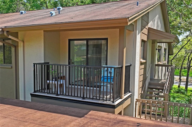 13009 Wedgewood Way Unit 63-D, Hudson, FL 34667 - entrance to property with stucco siding and a shingled roof