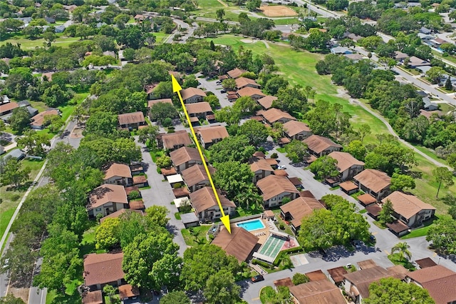 13009 Wedgewood Way Unit 63-D, Hudson, FL 34667 - aerial view of property and surrounding area featuring nearby suburban area, property parcel outlined, and a local golf course