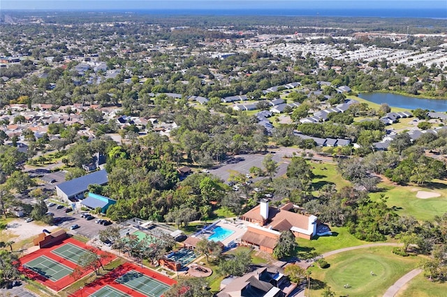 13009 Wedgewood Way Unit 63-D, Hudson, FL 34667 - drone / aerial view of a golf club and a nearby body of water