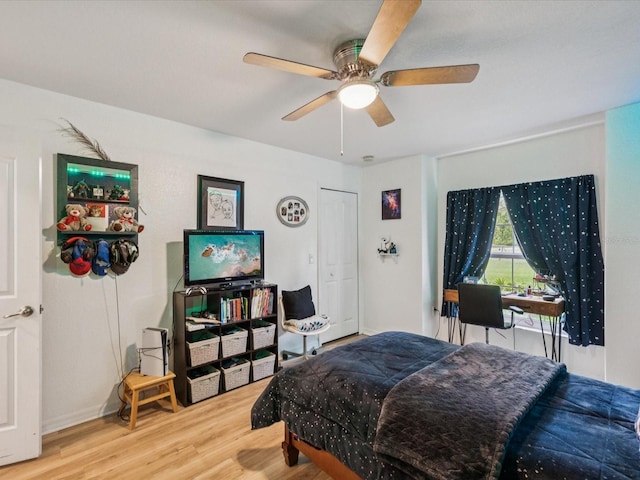 12229 Barnevelde Rd, Weeki Wachee, FL 34614 - bedroom featuring wood finished floors and a ceiling fan