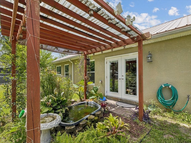 12229 Barnevelde Rd, Weeki Wachee, FL 34614 - view of patio / terrace featuring french doors and a pergola