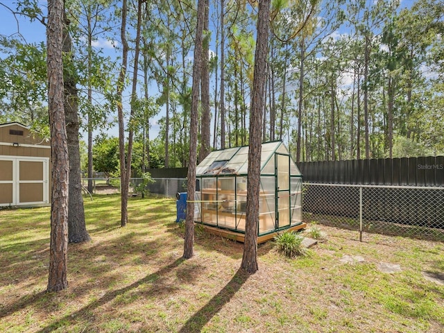 12229 Barnevelde Rd, Weeki Wachee, FL 34614 - view of yard with an exterior structure