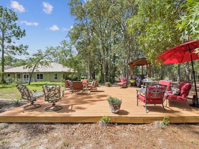 12229 Barnevelde Rd, Weeki Wachee, FL 34614 - wooden terrace featuring outdoor dining area