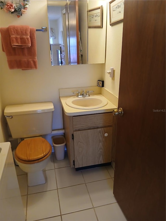 6050 Chesham Dr Unit 3, New Port Richey, FL 34653 - bathroom with vanity and tile patterned flooring
