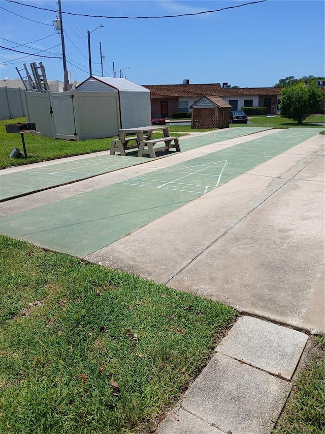 6050 Chesham Dr Unit 3, New Port Richey, FL 34653 - surrounding community featuring shuffleboard