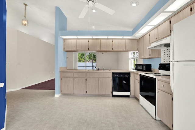 10935 New Brighton Ct, New Port Richey, FL 34654 - kitchen with black appliances, under cabinet range hood, healthy amount of natural light, light countertops, and lofted ceiling