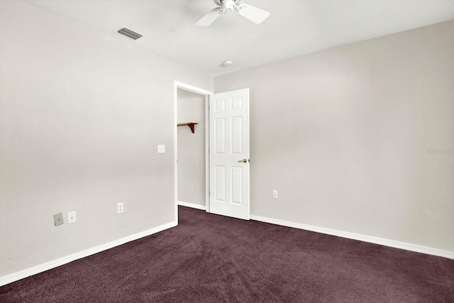 10935 New Brighton Ct, New Port Richey, FL 34654 - unfurnished room with a ceiling fan and dark colored carpet