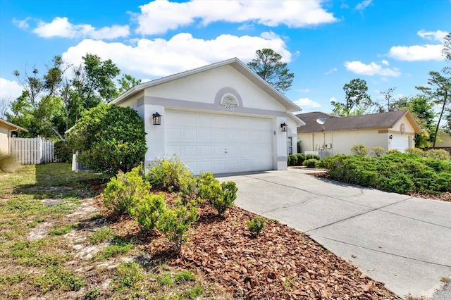 10935 New Brighton Ct, New Port Richey, FL 34654 - ranch-style home with concrete driveway, stucco siding, and a garage
