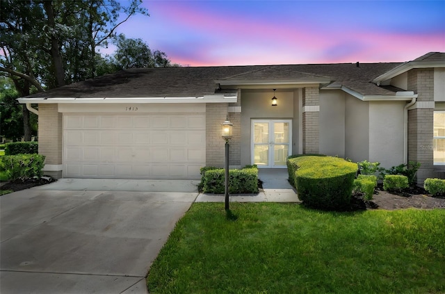 1415 Pinewood Hills Ct, Spring Hill, FL 34606 - single story home featuring french doors, brick siding, driveway, and an attached garage