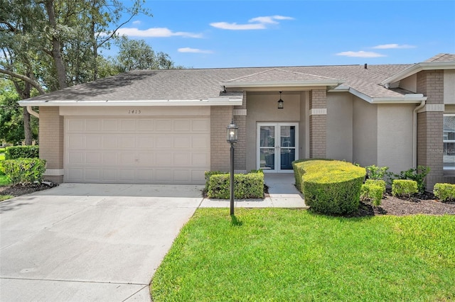 1415 Pinewood Hills Ct, Spring Hill, FL 34606 - view of front facade featuring french doors, brick siding, an attached garage, concrete driveway, and roof with shingles