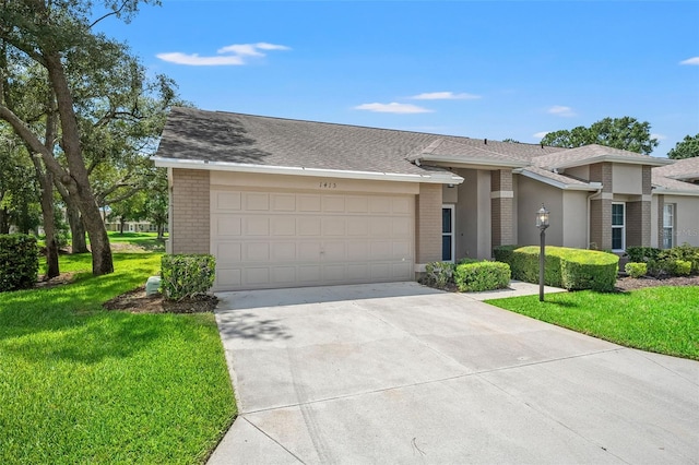 1415 Pinewood Hills Ct, Spring Hill, FL 34606 - view of front of house with an attached garage, concrete driveway, a front lawn, brick siding, and roof with shingles