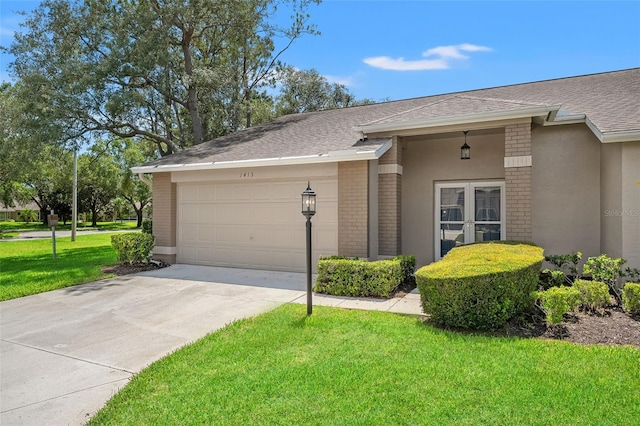 1415 Pinewood Hills Ct, Spring Hill, FL 34606 - view of front of home featuring brick siding, a garage, concrete driveway, and a front yard