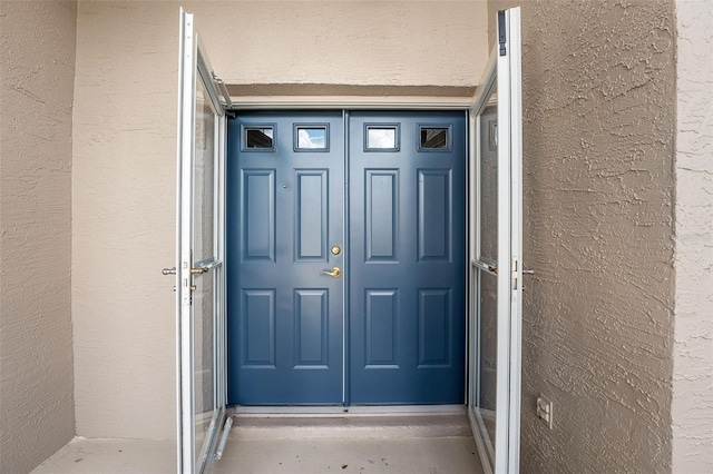 1415 Pinewood Hills Ct, Spring Hill, FL 34606 - entrance to property featuring stucco siding