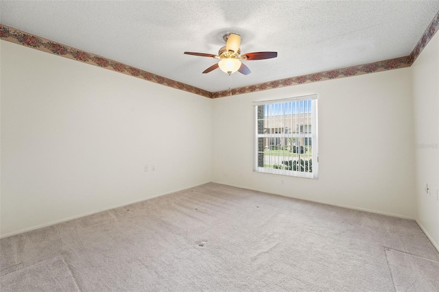 1415 Pinewood Hills Ct, Spring Hill, FL 34606 - carpeted empty room with ceiling fan and a textured ceiling