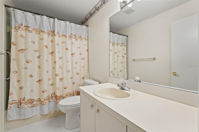 1415 Pinewood Hills Ct, Spring Hill, FL 34606 - full bathroom with a textured ceiling, tile patterned floors, and vanity