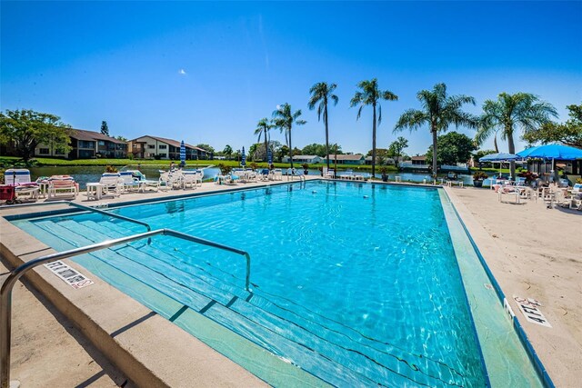 3841 Lanyard Ct Unit B, New Port Richey, FL 34652 - community pool featuring a patio