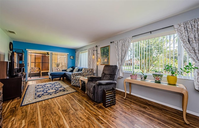 3841 Lanyard Ct Unit B, New Port Richey, FL 34652 - living area with wood finished floors and baseboards
