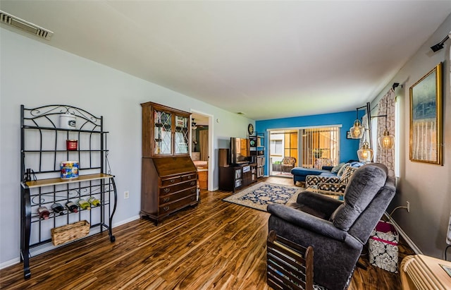 3841 Lanyard Ct Unit B, New Port Richey, FL 34652 - living area featuring wood finished floors and baseboards