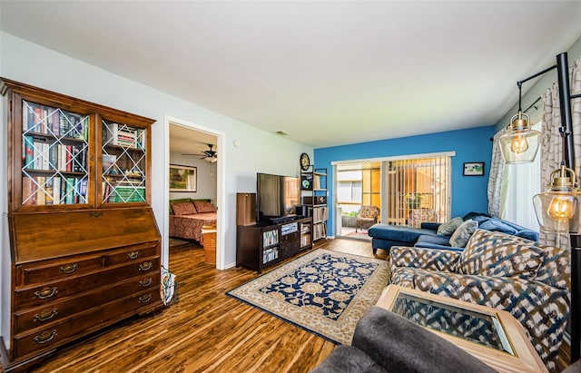 3841 Lanyard Ct Unit B, New Port Richey, FL 34652 - living room with wood finished floors and a ceiling fan