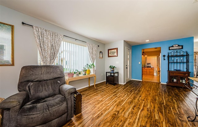 3841 Lanyard Ct Unit B, New Port Richey, FL 34652 - living area featuring wood finished floors and baseboards