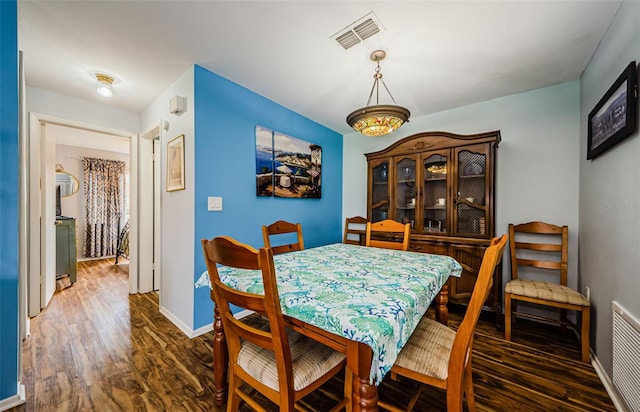 3841 Lanyard Ct Unit B, New Port Richey, FL 34652 - dining space with wood finished floors and baseboards