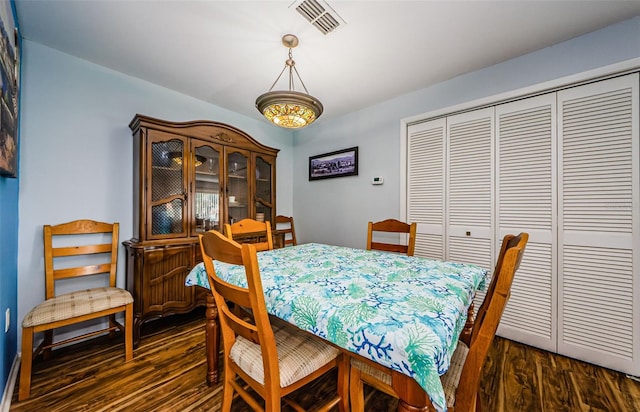 3841 Lanyard Ct Unit B, New Port Richey, FL 34652 - dining room with dark wood-style flooring