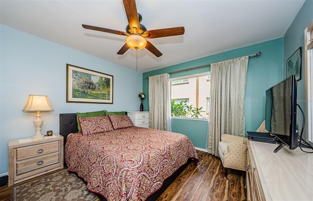 3841 Lanyard Ct Unit B, New Port Richey, FL 34652 - bedroom featuring dark wood-type flooring and ceiling fan