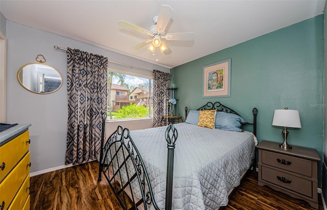 3841 Lanyard Ct Unit B, New Port Richey, FL 34652 - bedroom featuring dark wood-type flooring and ceiling fan