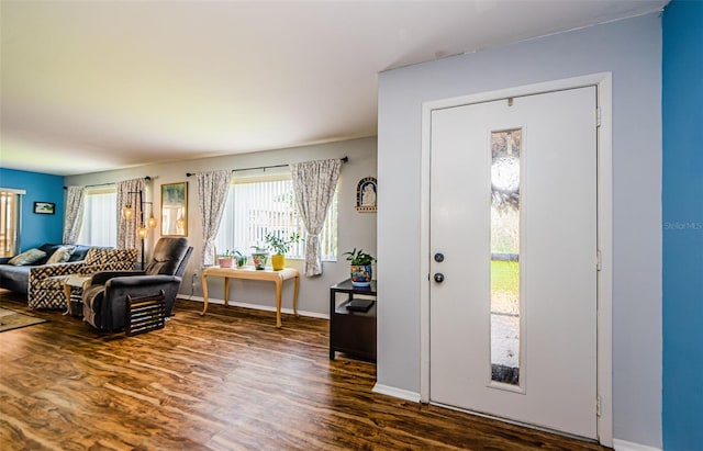 3841 Lanyard Ct Unit B, New Port Richey, FL 34652 - living area featuring dark wood-type flooring and baseboards