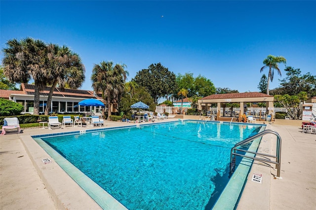 3841 Lanyard Ct Unit B, New Port Richey, FL 34652 - community pool with a gazebo and a patio