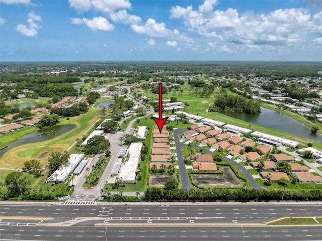 3317 Abigail Ct, New Port Richey, FL 34655 - aerial overview of property's location with a large body of water, nearby suburban area, and a golf course