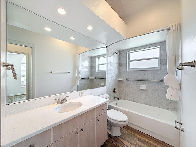 3317 Abigail Ct, New Port Richey, FL 34655 - full bathroom with shower / washtub combination, wood finished floors, vanity, and recessed lighting