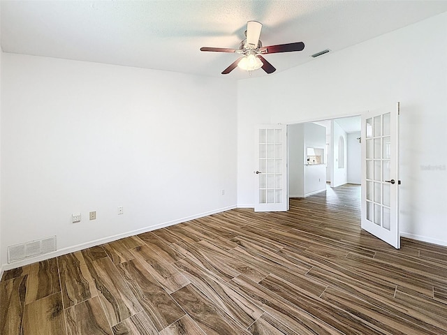 3317 Abigail Ct, New Port Richey, FL 34655 - empty room featuring french doors, wood finished floors, and a ceiling fan