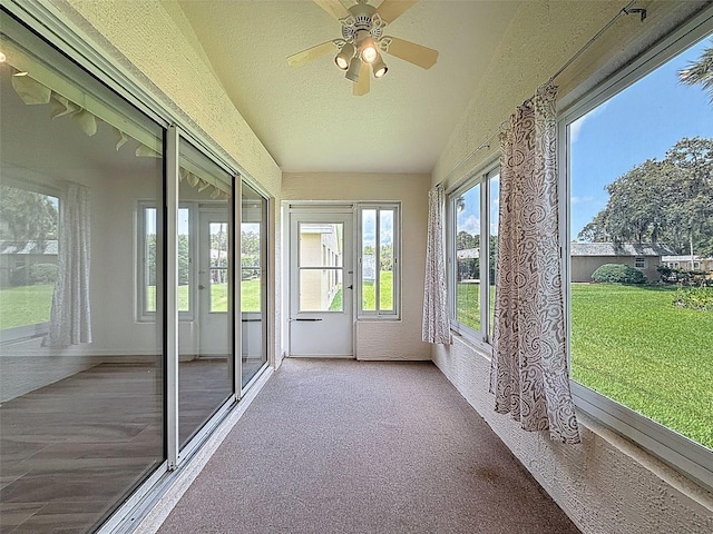 3317 Abigail Ct, New Port Richey, FL 34655 - unfurnished sunroom with plenty of natural light, a textured ceiling, and french doors