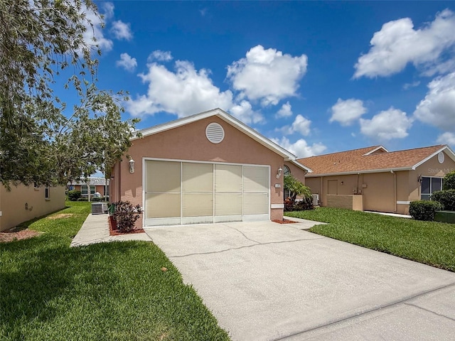 3317 Abigail Ct, New Port Richey, FL 34655 - ranch-style house with driveway, stucco siding, an attached garage, and a front yard