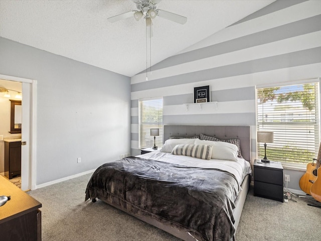 4716 Wolfram Ln, New Port Richey, FL 34653 - bedroom with carpet flooring, vaulted ceiling, connected bathroom, and ceiling fan