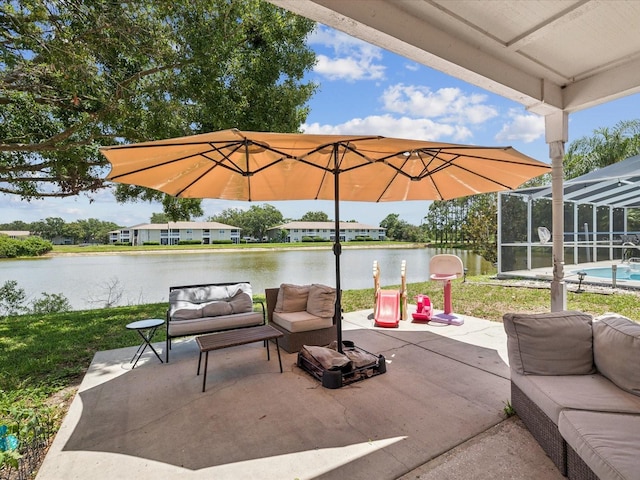 4716 Wolfram Ln, New Port Richey, FL 34653 - view of patio / terrace featuring an outdoor living space, a water view, a lanai, and an outdoor pool