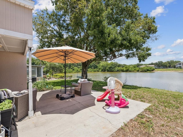 4716 Wolfram Ln, New Port Richey, FL 34653 - view of patio with a water view