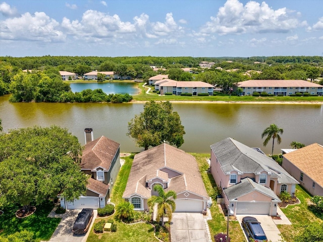 4716 Wolfram Ln, New Port Richey, FL 34653 - aerial view of residential area with a large body of water