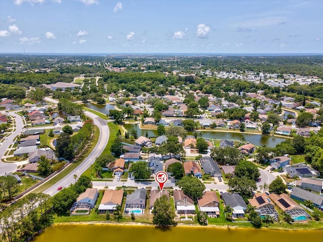 4716 Wolfram Ln, New Port Richey, FL 34653 - aerial view of residential area with a large body of water